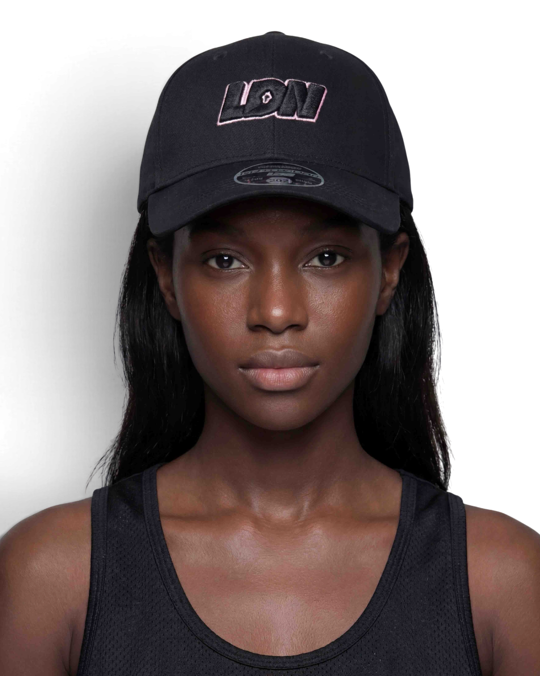 Black satin lined cap by Patt3rn Up LDN helping to reduce hair breakage, prevent frizz and retain moisture for curly, coily and textured hair.