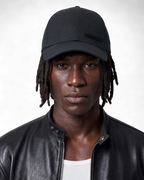 Black satin lined cap by Patt3rn Up LDN helping to reduce hair breakage, prevent frizz and retain moisture for curly, coily and textured hair.